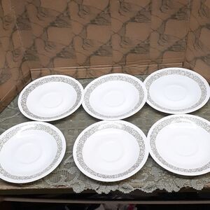 6 pc. Corelle "Woodland" pattern saucers.